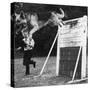 A German Shepherd Police Dog Jumping a Hurdle During a Training Session-null-Stretched Canvas