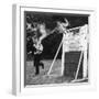 A German Shepherd Police Dog Jumping a Hurdle During a Training Session-null-Framed Photographic Print