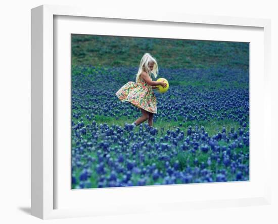 A Girl, 3, Goes for a Romp Through a Field of Bluebonnets-null-Framed Premium Photographic Print