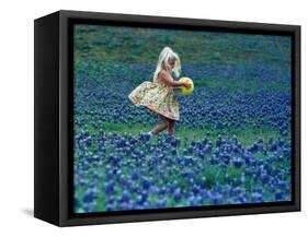 A Girl, 3, Goes for a Romp Through a Field of Bluebonnets-null-Framed Stretched Canvas