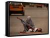 A Girl, 7, Sick with Fever, Lies on a Street-null-Framed Stretched Canvas