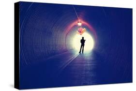 A Girl at the End of a Tunnel Holding Balloons-graphicphoto-Stretched Canvas