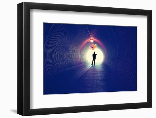 A Girl at the End of a Tunnel Holding Balloons-graphicphoto-Framed Photographic Print