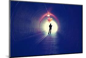 A Girl at the End of a Tunnel Holding Balloons-graphicphoto-Mounted Photographic Print