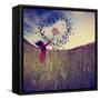 A Girl in a Field Tossing a Birdcage in the Air with Birds Flying in the Shape of a Heart Toned Wit-graphicphoto-Framed Stretched Canvas