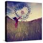 A Girl in a Field Tossing a Birdcage in the Air with Birds Flying in the Shape of a Heart Toned Wit-graphicphoto-Stretched Canvas