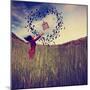 A Girl in a Field Tossing a Birdcage in the Air with Birds Flying in the Shape of a Heart Toned Wit-graphicphoto-Mounted Photographic Print