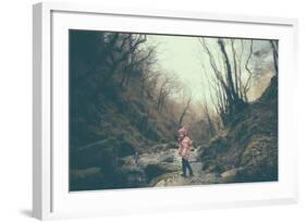 A Girl on a Boulder Looking Towards Camera-Clive Nolan-Framed Photographic Print