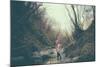 A Girl on a Boulder Looking Towards Camera-Clive Nolan-Mounted Photographic Print