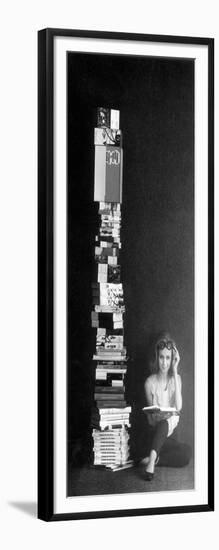 A Girl Reads Beside a Pile of Books-null-Framed Giclee Print