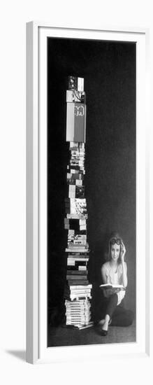 A Girl Reads Beside a Pile of Books-null-Framed Giclee Print