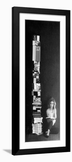 A Girl Reads Beside a Pile of Books-null-Framed Giclee Print