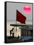 A Girl Rests on a Boat Below the Chinese National Flag-null-Framed Stretched Canvas