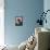 A Girl Rests on a Boat Below the Chinese National Flag-null-Framed Stretched Canvas displayed on a wall