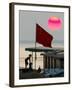 A Girl Rests on a Boat Below the Chinese National Flag-null-Framed Photographic Print