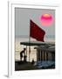 A Girl Rests on a Boat Below the Chinese National Flag-null-Framed Photographic Print