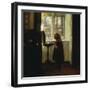 A Girl Standing by a Sewing Table-Carl Holsoe-Framed Giclee Print