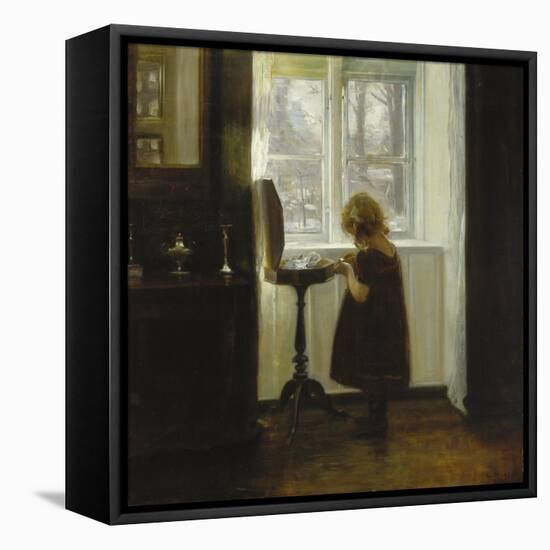 A Girl Standing by a Sewing Table-Carl Holsoe-Framed Stretched Canvas