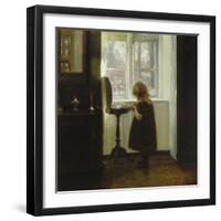 A Girl Standing by a Sewing Table-Carl Holsoe-Framed Giclee Print