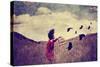 A Girl Walking in a Field with a Flock of Birds Done with a Vintage Retro Instagram Filter-graphicphoto-Stretched Canvas
