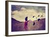 A Girl Walking in a Field with a Flock of Birds Done with a Vintage Retro Instagram Filter-graphicphoto-Framed Photographic Print