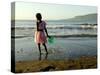 A Girl Walks on the Beach in Jacmel, Haiti, in This February 5, 2001-Lynne Sladky-Stretched Canvas