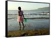 A Girl Walks on the Beach in Jacmel, Haiti, in This February 5, 2001-Lynne Sladky-Framed Stretched Canvas