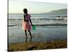 A Girl Walks on the Beach in Jacmel, Haiti, in This February 5, 2001-Lynne Sladky-Stretched Canvas