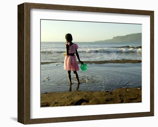 A Girl Walks on the Beach in Jacmel, Haiti, in This February 5, 2001-Lynne Sladky-Framed Premium Photographic Print