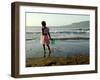 A Girl Walks on the Beach in Jacmel, Haiti, in This February 5, 2001-Lynne Sladky-Framed Premium Photographic Print