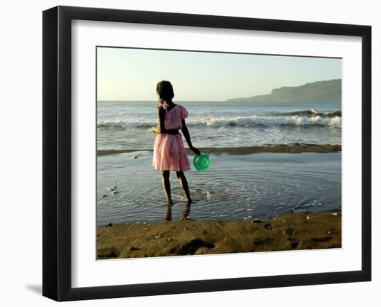 A Girl Walks on the Beach in Jacmel, Haiti, in This February 5, 2001-Lynne Sladky-Framed Premium Photographic Print