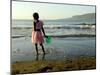 A Girl Walks on the Beach in Jacmel, Haiti, in This February 5, 2001-Lynne Sladky-Mounted Premium Photographic Print