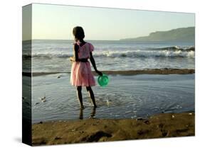 A Girl Walks on the Beach in Jacmel, Haiti, in This February 5, 2001-Lynne Sladky-Stretched Canvas