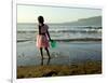 A Girl Walks on the Beach in Jacmel, Haiti, in This February 5, 2001-Lynne Sladky-Framed Photographic Print