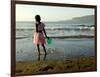 A Girl Walks on the Beach in Jacmel, Haiti, in This February 5, 2001-Lynne Sladky-Framed Photographic Print