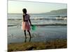 A Girl Walks on the Beach in Jacmel, Haiti, in This February 5, 2001-Lynne Sladky-Mounted Photographic Print