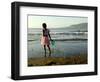 A Girl Walks on the Beach in Jacmel, Haiti, in This February 5, 2001-Lynne Sladky-Framed Photographic Print