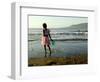 A Girl Walks on the Beach in Jacmel, Haiti, in This February 5, 2001-Lynne Sladky-Framed Photographic Print