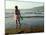 A Girl Walks on the Beach in Jacmel, Haiti, in This February 5, 2001-Lynne Sladky-Mounted Photographic Print