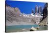 A glacial lake and the rock towers that give the Torres del Paine range its name, Torres del Paine-Alex Robinson-Stretched Canvas