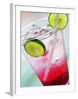 A Glass of Raspberry Soda with Ice Cubes and Lime Slices-null-Framed Photographic Print