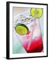 A Glass of Raspberry Soda with Ice Cubes and Lime Slices-null-Framed Photographic Print