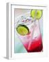 A Glass of Raspberry Soda with Ice Cubes and Lime Slices-null-Framed Photographic Print