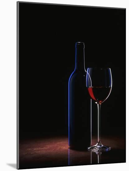 A Glass of Red Wine and a Wine Bottle-Roland Krieg-Mounted Photographic Print