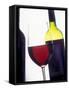 A Glass of Red Wine with a Bottle in the Background-Armin Faber-Framed Stretched Canvas