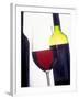 A Glass of Red Wine with a Bottle in the Background-Armin Faber-Framed Photographic Print