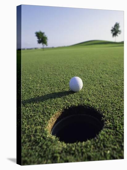 A Golf Ball Just Short of the Hole-null-Stretched Canvas