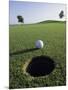 A Golf Ball Just Short of the Hole-null-Mounted Photographic Print