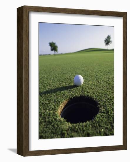 A Golf Ball Just Short of the Hole-null-Framed Photographic Print