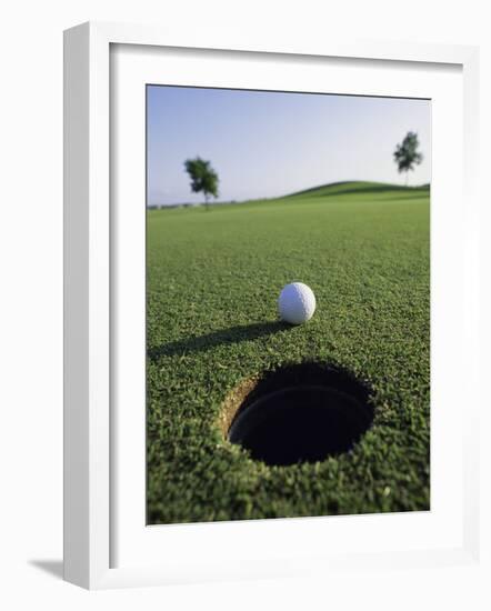 A Golf Ball Just Short of the Hole-null-Framed Photographic Print